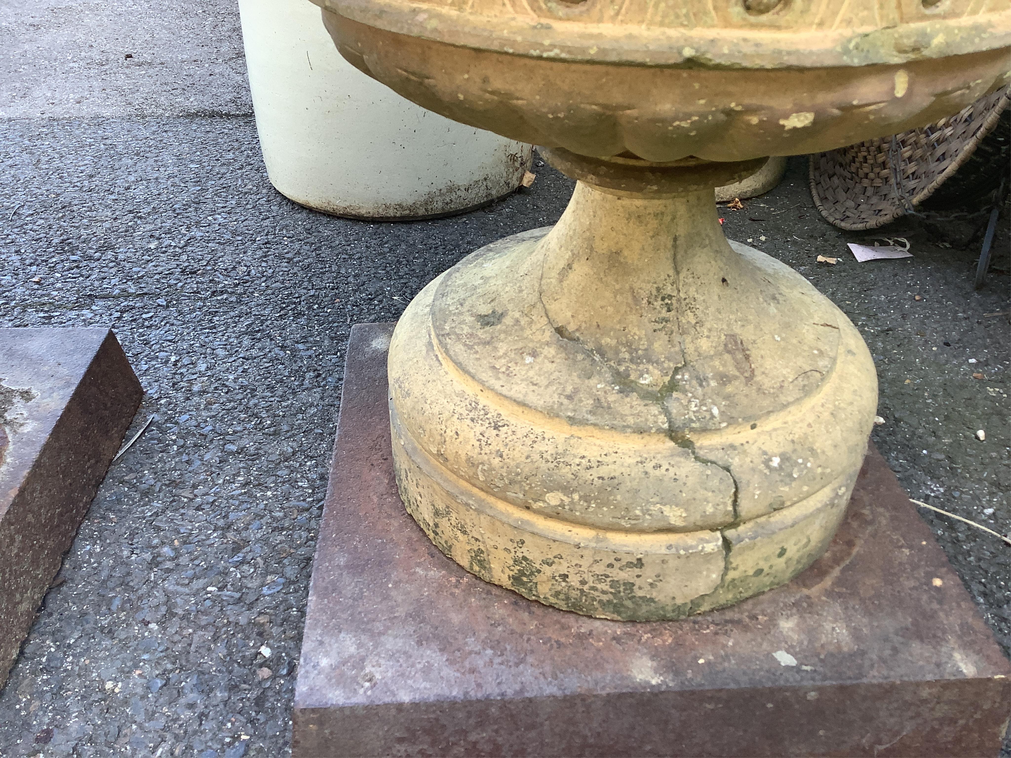 A pair of Coadestone pedestal planters, diameter 53cm, height 58cm. Condition - fair